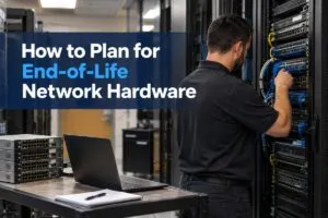 Technician replacing end of life network hardware during a DeployNation network infrastructure refresh.